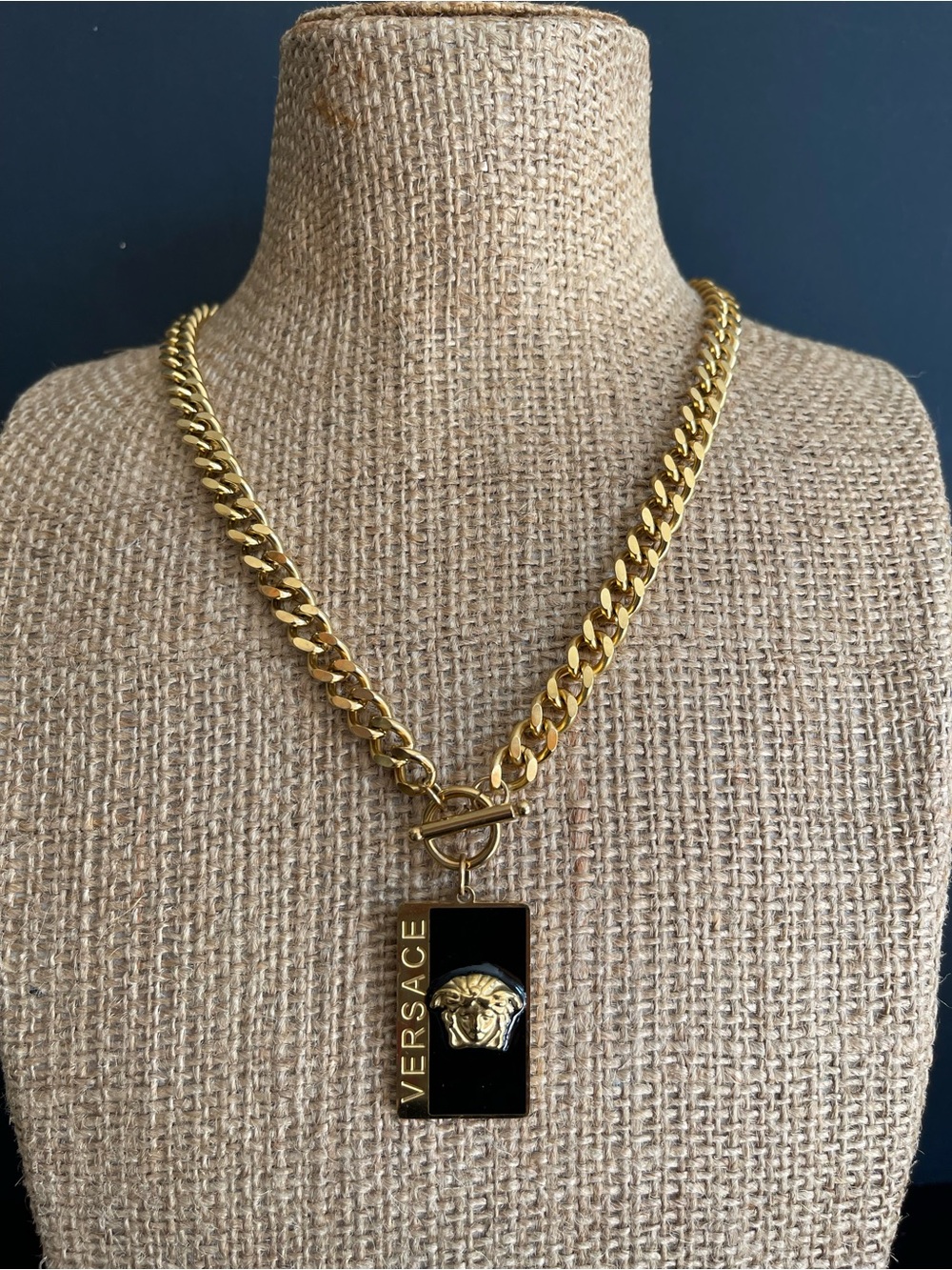 18KT gold plated Medusa head necklace.